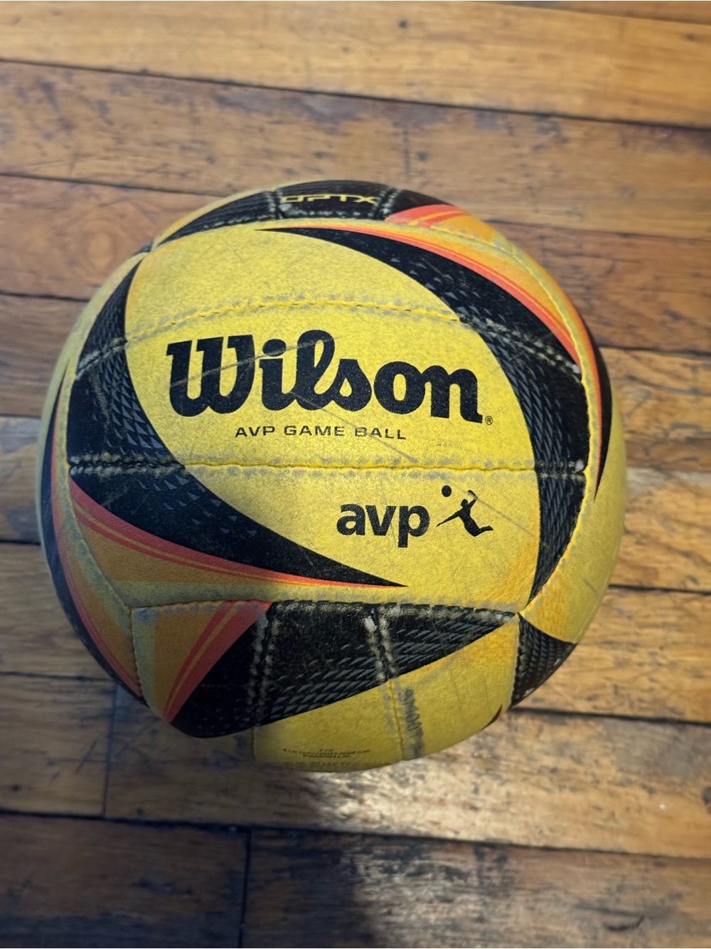 Wilson Yellow Black AVP Game Volleyball with Orange Accents
